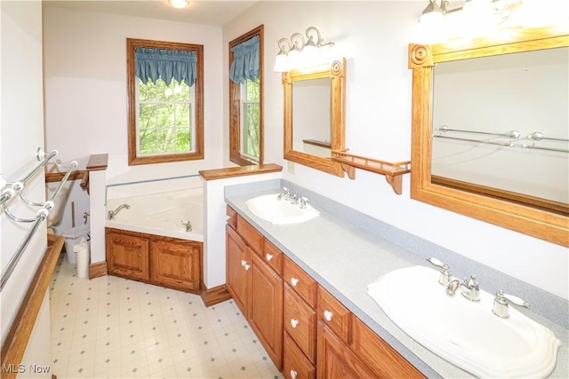 5280 Kapok Dr, Medina, OH 44256 - full bath featuring double vanity, a bath, and tile patterned floors