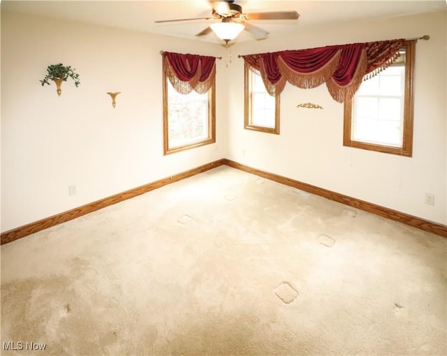 5280 Kapok Dr, Medina, OH 44256 - carpeted empty room featuring ceiling fan, healthy amount of natural light, and baseboards