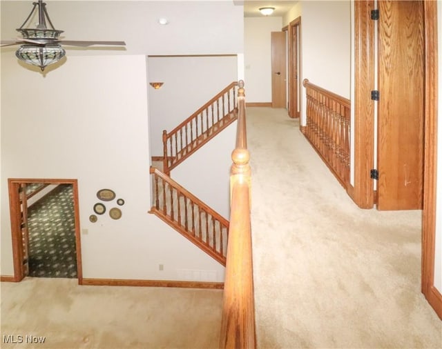 5280 Kapok Dr, Medina, OH 44256 - stairway featuring carpet, a ceiling fan, and baseboards
