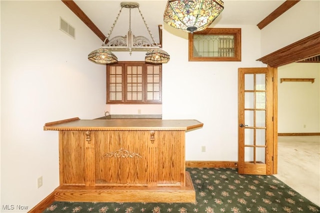 5280 Kapok Dr, Medina, OH 44256 - unfurnished dining area with carpet flooring, baseboards, and ornamental molding