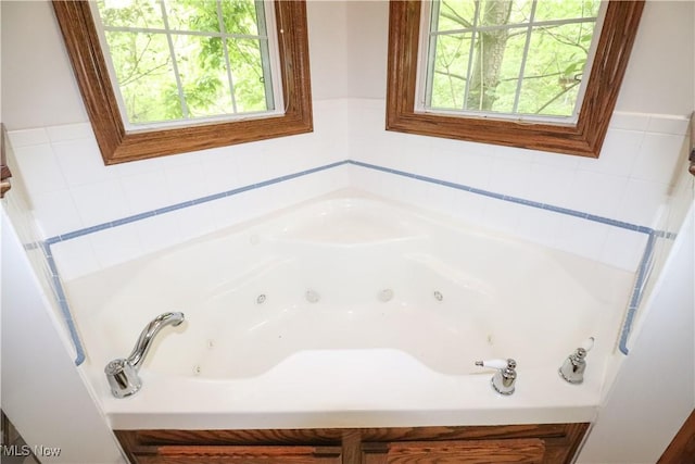 5280 Kapok Dr, Medina, OH 44256 - bathroom featuring a tub with jets