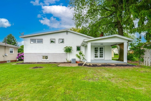 1924 Tiffany Dr NE, Warren, OH 44483 - back of property featuring central air condition unit