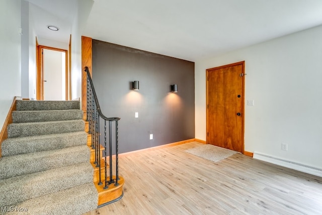 1924 Tiffany Dr NE, Warren, OH 44483 - foyer featuring stairway, wood finished floors, baseboards, and baseboard heating