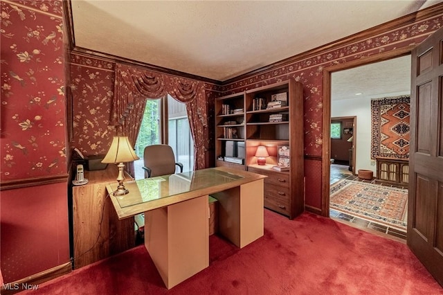 10576 Hemlock Ridge Dr, Chardon, OH 44024 - carpeted home office featuring wallpapered walls, ornamental molding, and a textured ceiling