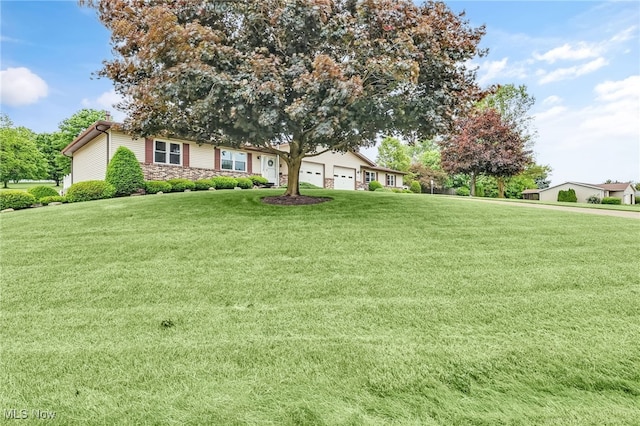 14031405 Frank Dr, Wooster, OH 44691 - ranch-style home featuring a front lawn, a garage, and stone siding