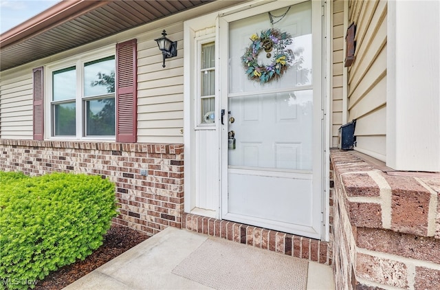 14031405 Frank Dr, Wooster, OH 44691 - doorway to property featuring brick siding and covered porch