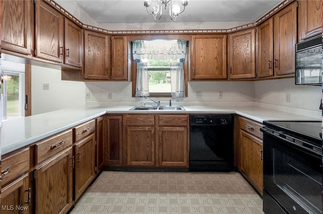 14031405 Frank Dr, Wooster, OH 44691 - kitchen featuring black appliances, a sink, a chandelier, and brown cabinets