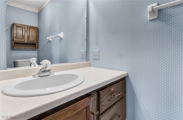 14031405 Frank Dr, Wooster, OH 44691 - bathroom featuring vanity, wallpapered walls, toilet, and crown molding