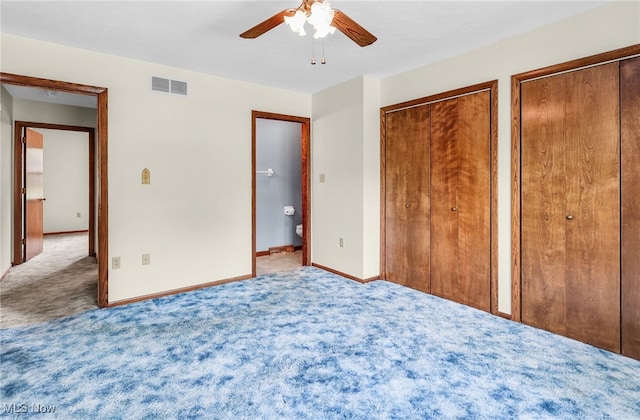 14031405 Frank Dr, Wooster, OH 44691 - unfurnished bedroom with carpet flooring, two closets, baseboards, and a ceiling fan
