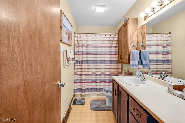 14031405 Frank Dr, Wooster, OH 44691 - full bath with vanity, toilet, tile patterned floors, and a shower with shower curtain