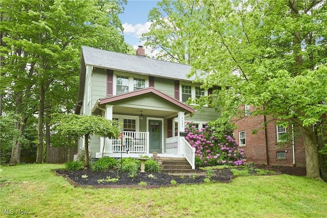 4531 Ardendale Rd, South Euclid, OH 44121 - view of front facade with covered porch and a chimney