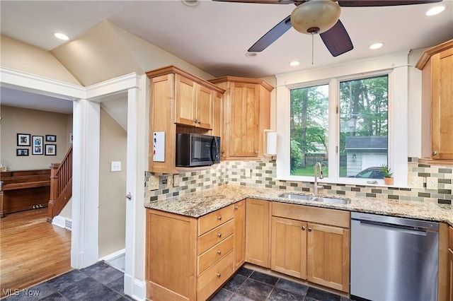 4531 Ardendale Rd, South Euclid, OH 44121 - kitchen featuring stainless steel dishwasher, a sink, black microwave, a ceiling fan, and light stone counters