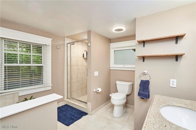 4531 Ardendale Rd, South Euclid, OH 44121 - full bathroom with toilet, a stall shower, vanity, and tile patterned flooring