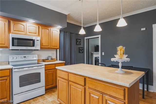 kitchen with white appliances, light wood-style floors, light countertops, tasteful backsplash, and crown molding