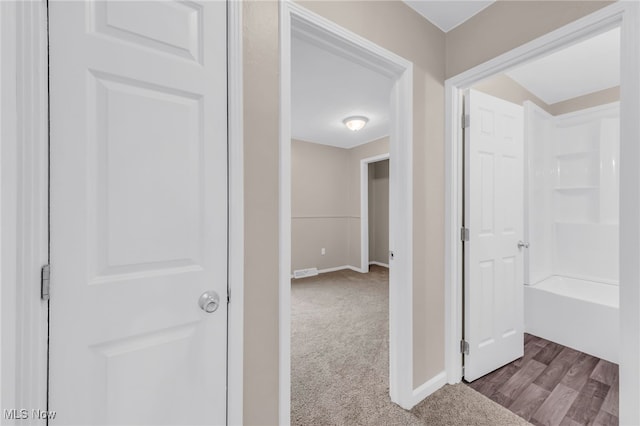 180 Glenn St, Barberton, OH 44203 - hallway with carpet and baseboards