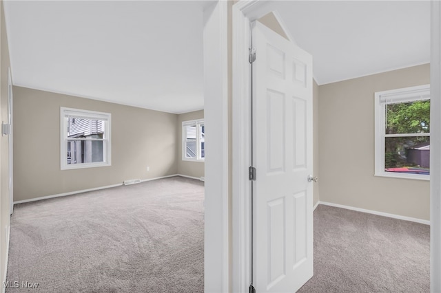 180 Glenn St, Barberton, OH 44203 - carpeted empty room with baseboards