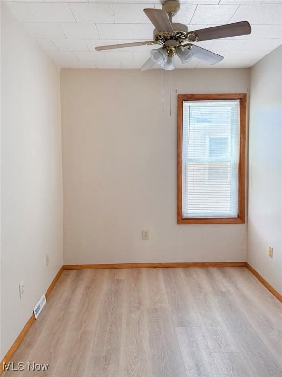 5417 Brow Ave, Newburgh Heights, OH 44105 - spare room with light wood-style flooring, baseboards, and a ceiling fan