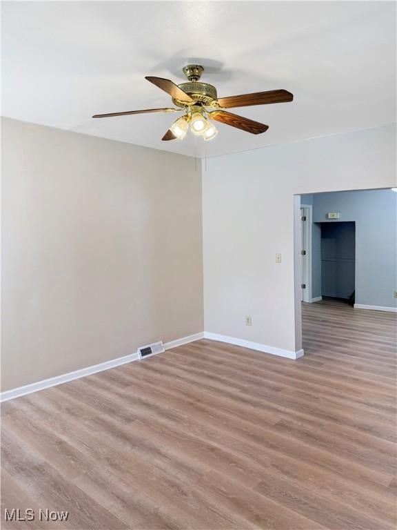 5417 Brow Ave, Newburgh Heights, OH 44105 - spare room featuring ceiling fan, light wood-style floors, and baseboards