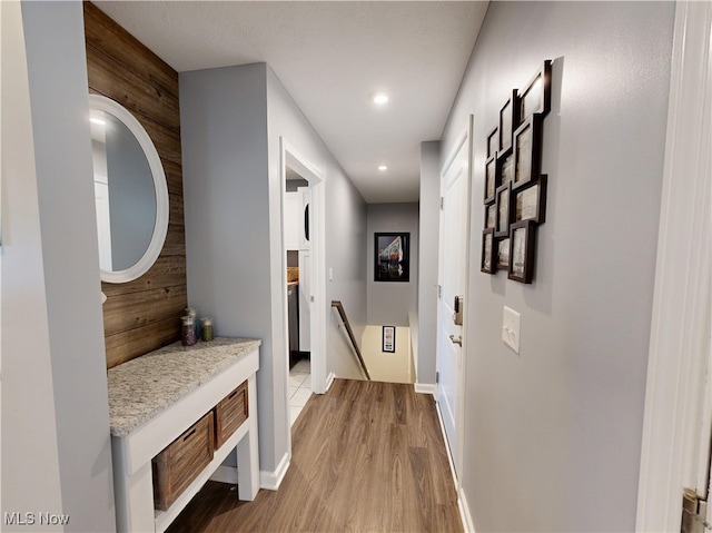 515 Prestwick Path, Painesville, OH 44077 - hallway with an upstairs landing, wood finished floors, baseboards, and recessed lighting