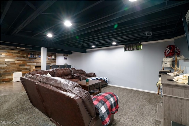 20686 Wildwood Ln, Strongsville, OH 44149 - carpeted living room with baseboards, recessed lighting, and wooden walls