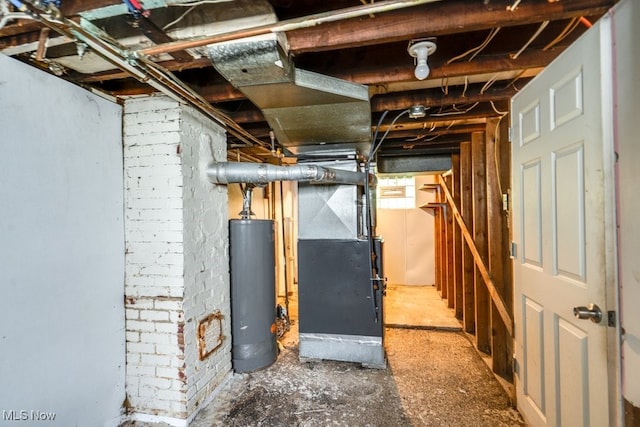 1866 17th St SW, Akron, OH 44314 - unfinished below grade area featuring water heater and heating unit
