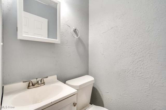 1866 17th St SW, Akron, OH 44314 - half bathroom with toilet and vanity