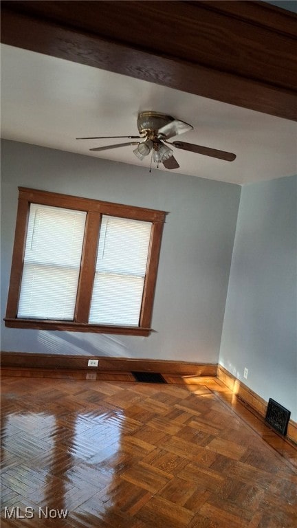 3301 W 94th St, Cleveland, OH 44102 - spare room with baseboards and ceiling fan