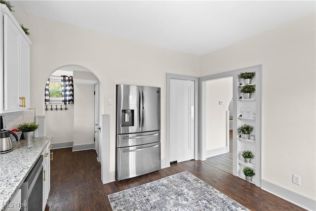 3652 Brightway St, Weirton, WV 26062 - kitchen with stainless steel refrigerator with ice dispenser, baseboards, dark wood finished floors, and white cabinetry