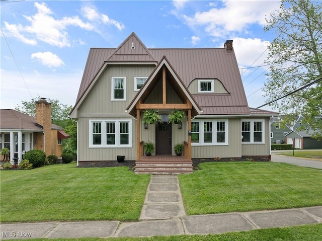 3652 Brightway St, Weirton, WV 26062 - view of front of home featuring a standing seam roof, a front lawn, metal roof, and a chimney