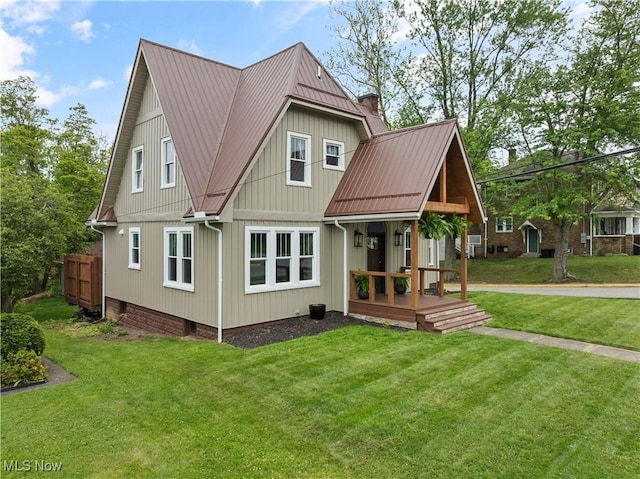 3652 Brightway St, Weirton, WV 26062 - view of front facade featuring a front lawn, metal roof, a standing seam roof, and a chimney