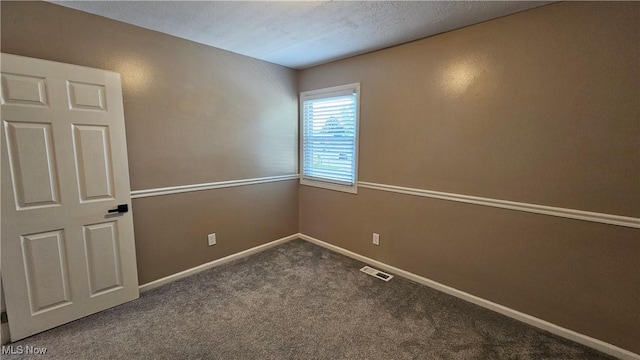 3970 Royal Liverpool Dr Unit A, Uniontown, OH 44685 - carpeted empty room featuring baseboards