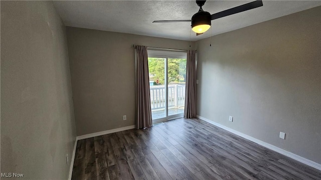 3970 Royal Liverpool Dr Unit A, Uniontown, OH 44685 - unfurnished room featuring dark wood finished floors, baseboards, a ceiling fan, and a textured ceiling