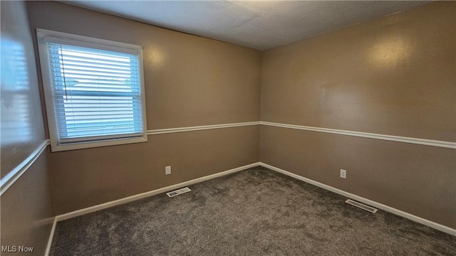 3970 Royal Liverpool Dr Unit A, Uniontown, OH 44685 - empty room with carpet floors and baseboards