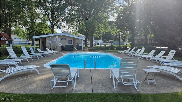 3970 Royal Liverpool Dr Unit A, Uniontown, OH 44685 - community pool featuring a patio area