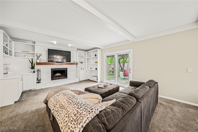 20393 Wildwood Ln, Strongsville, OH 44149 - living area with carpet floors, a fireplace, beam ceiling, and baseboards
