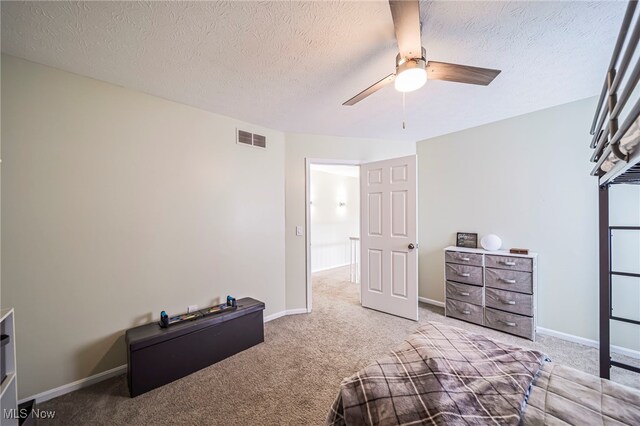 20393 Wildwood Ln, Strongsville, OH 44149 - bedroom featuring carpet flooring, a ceiling fan, a textured ceiling, and baseboards