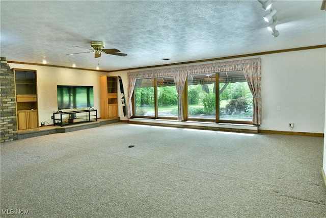 2942 Barclay Messerly Rd, Southington, OH 44470 - unfurnished living room featuring a ceiling fan, carpet floors, baseboards, crown molding, and a textured ceiling