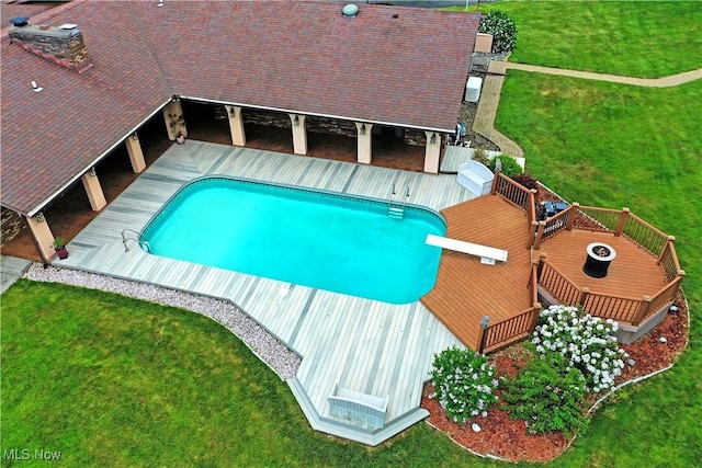2942 Barclay Messerly Rd, Southington, OH 44470 - swimming pool with a deck, a lawn, and a diving board