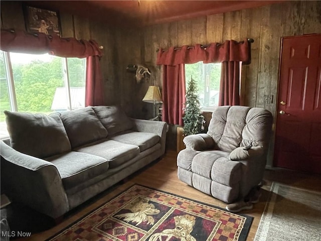 13929 Old Glory Rd, Lore City, OH 43755 - living room with wooden walls and wood finished floors