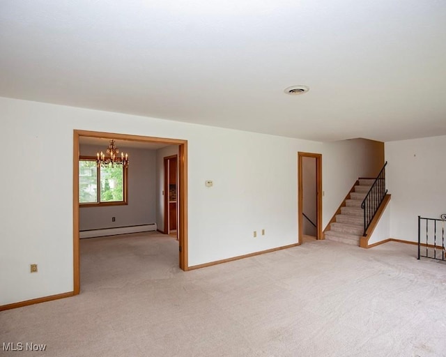 433 University Ave, Elyria, OH 44035 - empty room featuring a baseboard radiator, light carpet, a chandelier, baseboards, and stairs