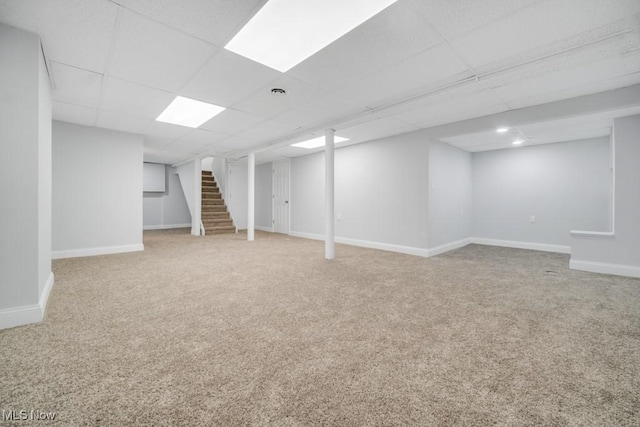 2186 Jackson Blvd, University Heights, OH 44118 - finished below grade area with carpet floors, stairs, a drop ceiling, and baseboards