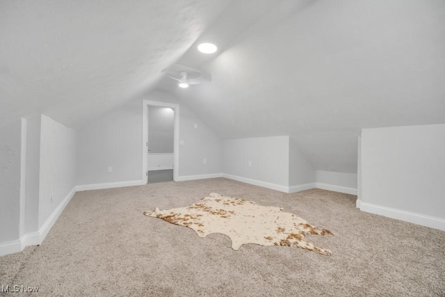 2186 Jackson Blvd, University Heights, OH 44118 - additional living space featuring vaulted ceiling, carpet floors, and baseboards