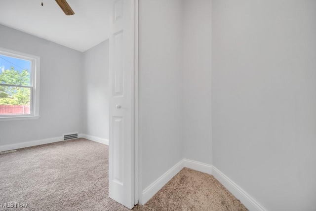 2186 Jackson Blvd, University Heights, OH 44118 - carpeted spare room with baseboards and ceiling fan