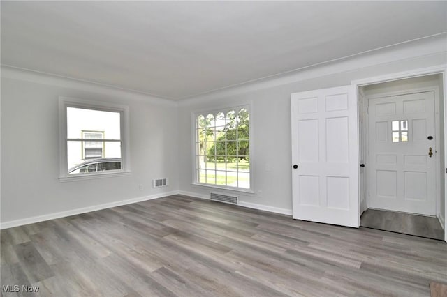 3890 Grosvenor Rd, South Euclid, OH 44118 - spare room with wood finished floors and baseboards