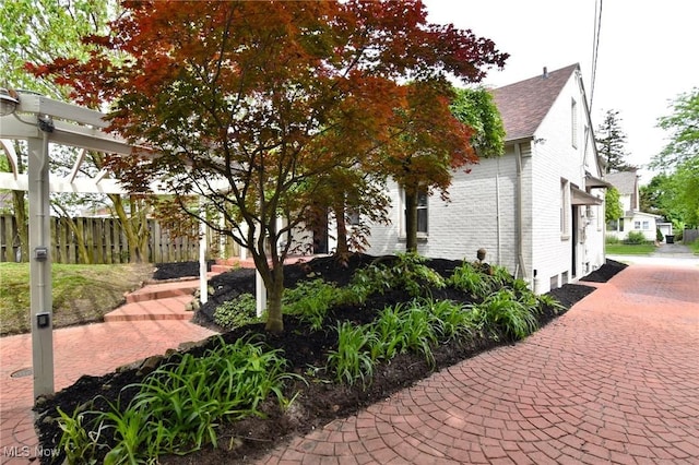 3890 Grosvenor Rd, South Euclid, OH 44118 - view of property exterior with roof with shingles