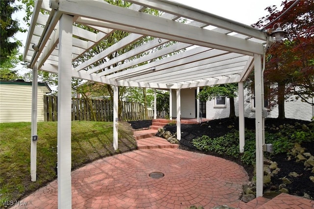 3890 Grosvenor Rd, South Euclid, OH 44118 - view of patio featuring a pergola and an outdoor structure