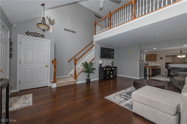 3347 Reserve Dr Unit 36, Cuyahoga Falls, OH 44223 - foyer with stairway, wood finished floors, high vaulted ceiling, a ceiling fan, and baseboards