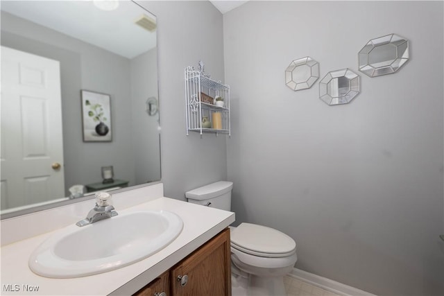3347 Reserve Dr Unit 36, Cuyahoga Falls, OH 44223 - half bath featuring toilet, vanity, and baseboards