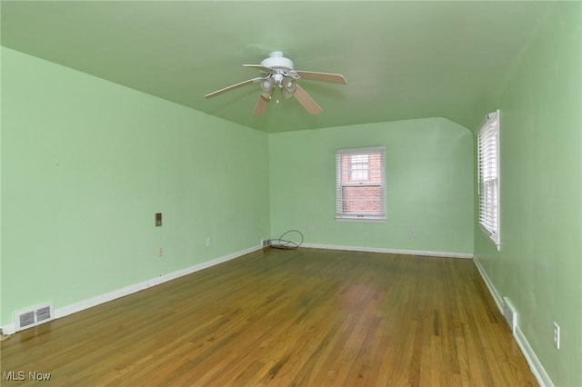 3927 Princeton Blvd, South Euclid, OH 44121 - empty room with wood finished floors, a ceiling fan, and baseboards