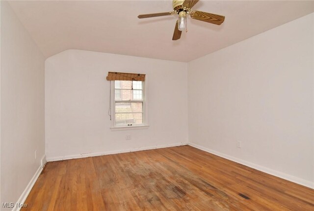 3927 Princeton Blvd, South Euclid, OH 44121 - unfurnished room featuring wood finished floors, baseboards, and a ceiling fan